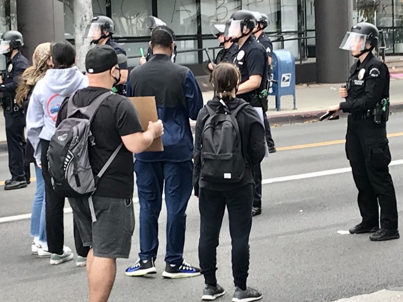 california riot police dealing with rioters